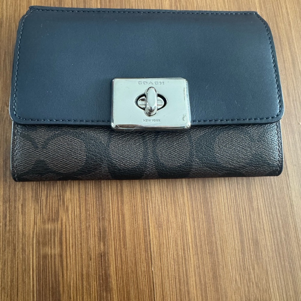 Coach monogram and navy wallet.